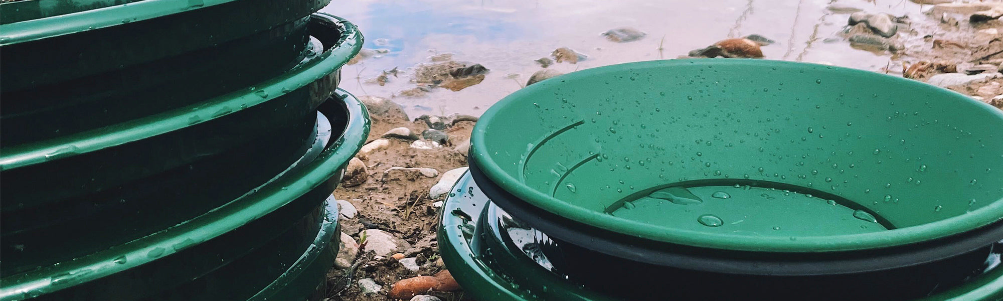 Gold Pan Set of 8 inch 10 inch 12 inch gold panning by a river