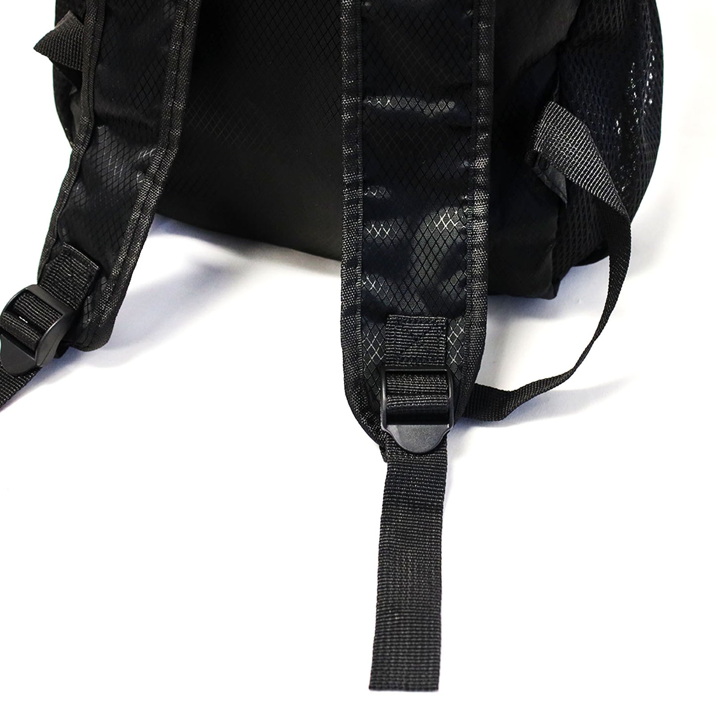 collapsible all black backpack transforms from as small as a pencil pouch to a medium sized backpack