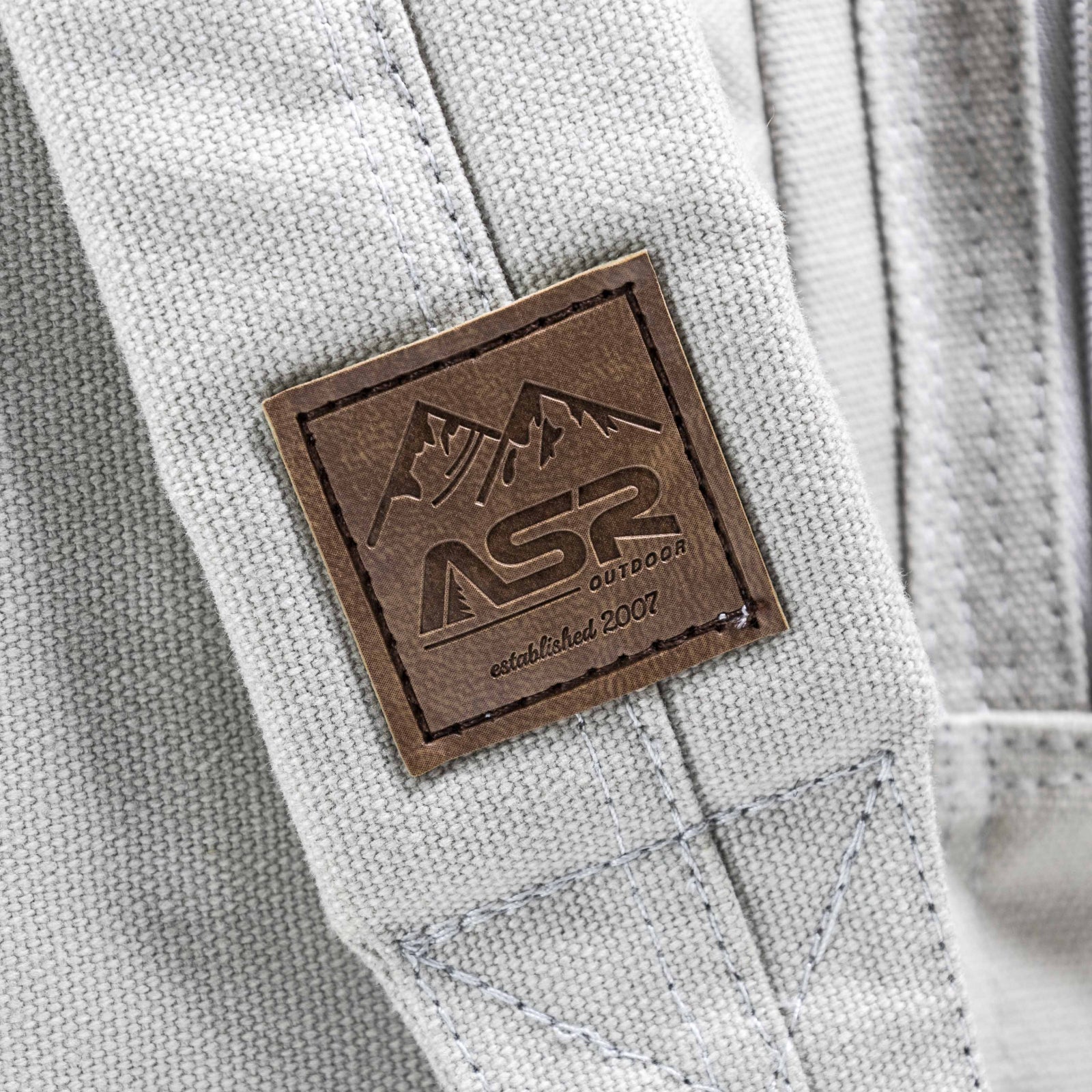 close detailed shot of ASR Outdoor's logo on a backpack