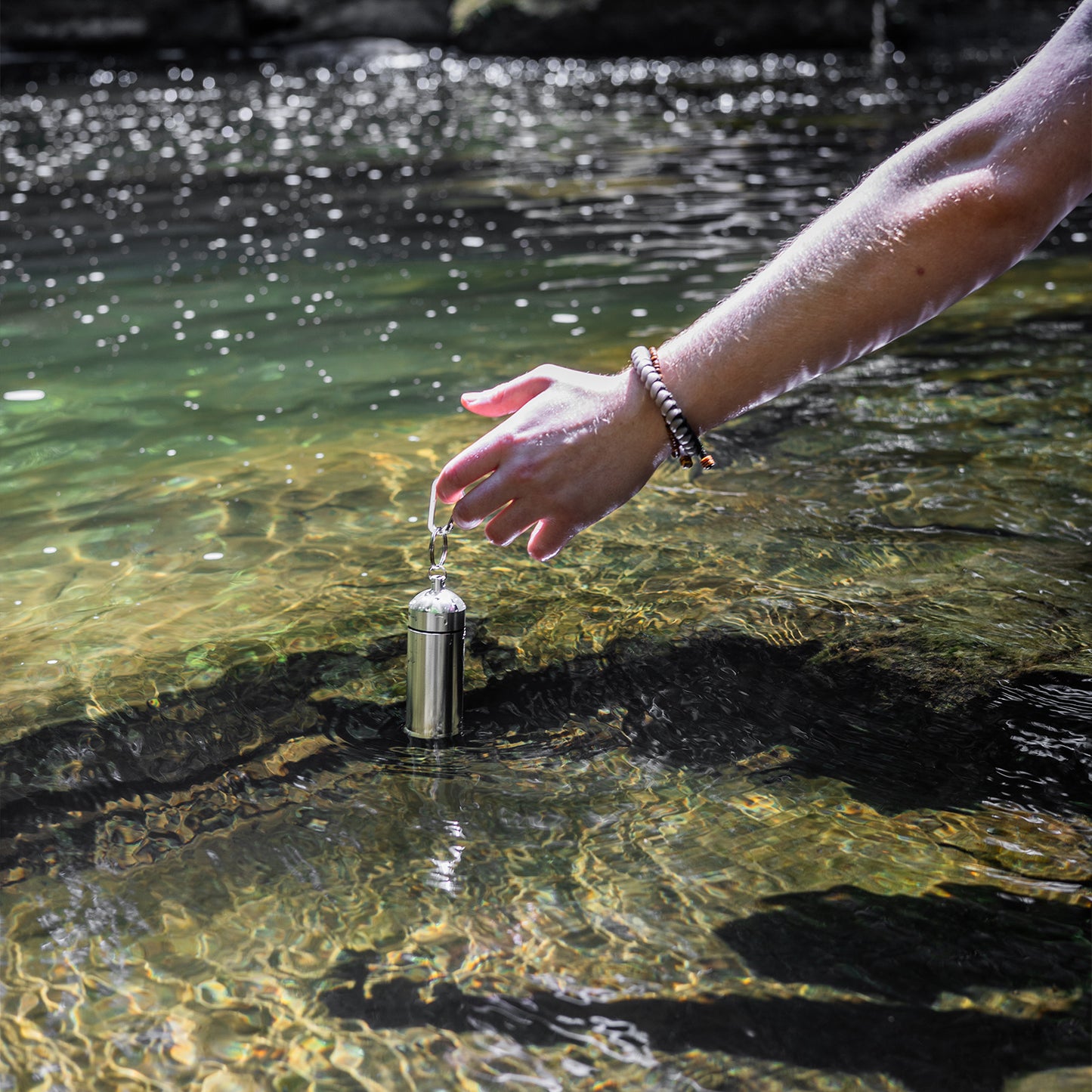 Waterproof aluminum storage containers that fit on your keychain