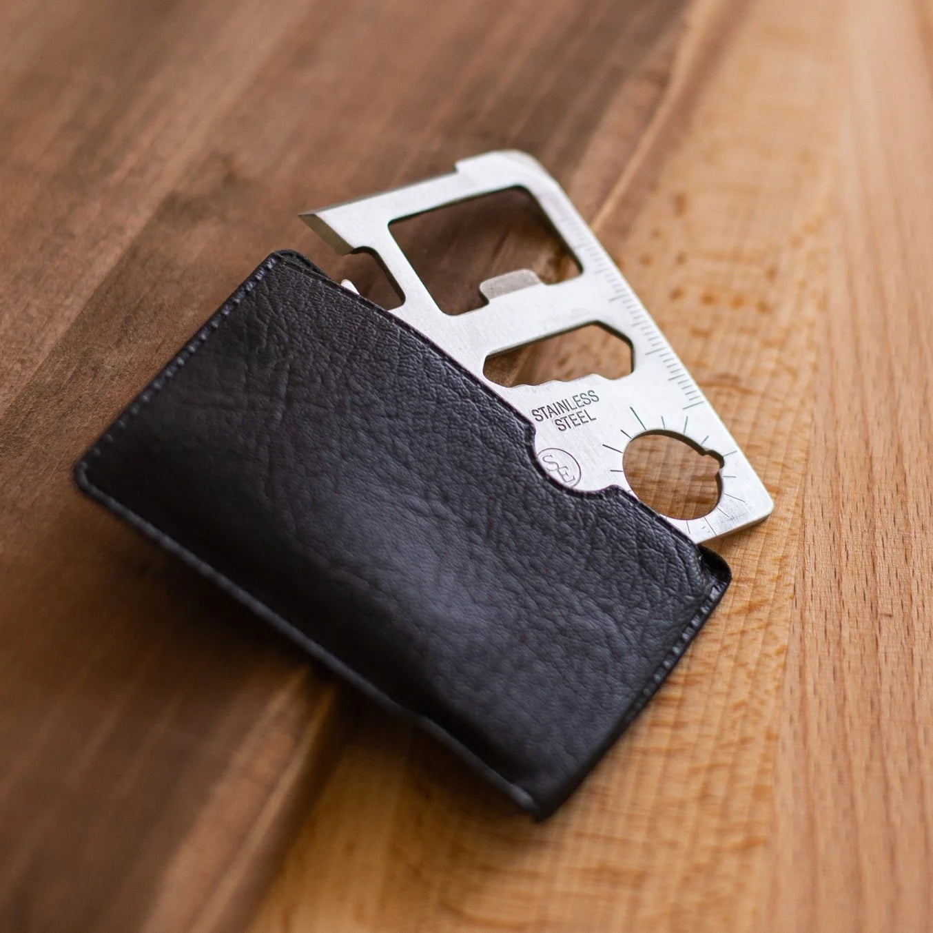 steel 11 in 1 multitool credit card with card sleeve