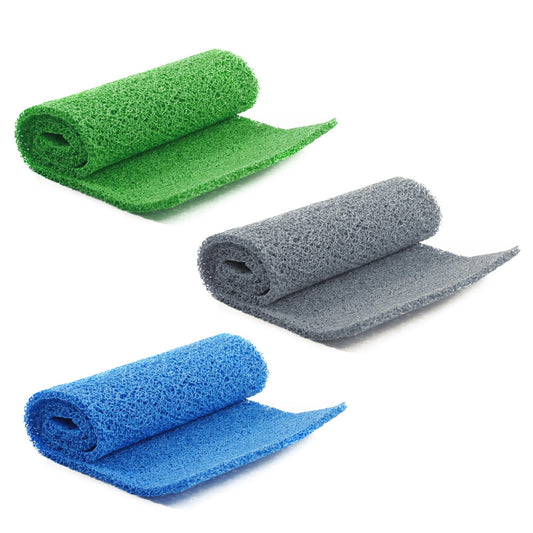 Rolls of Miners Moss Sluice Box Matting in green, gray, and blue colors, typically used for gold prospecting.