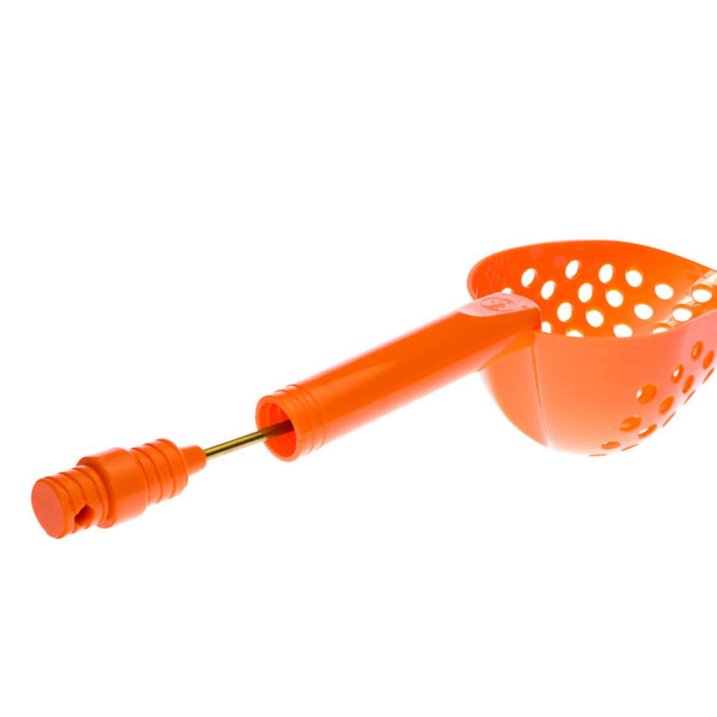 Orange plastic trowel with a classifying holes to sift out rock