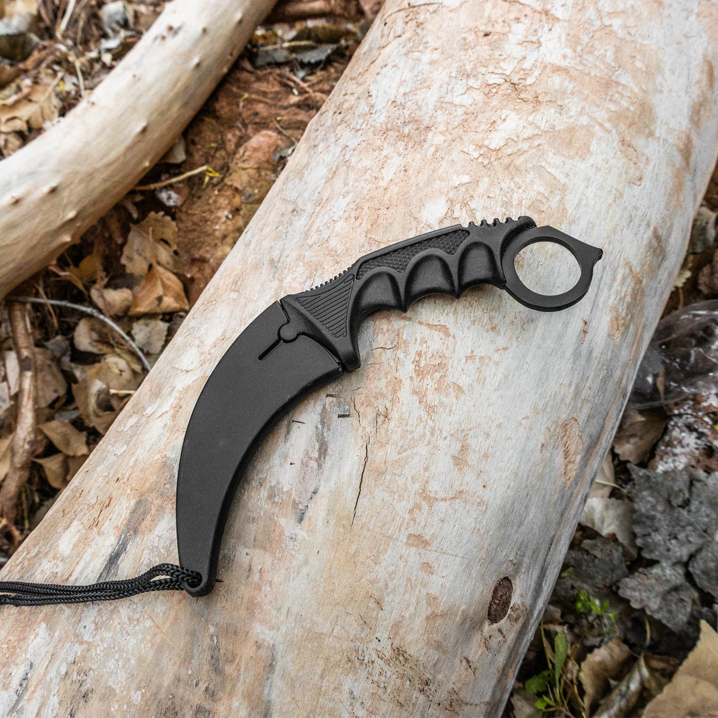 All black karambit curved blade knife handle made to fit hand