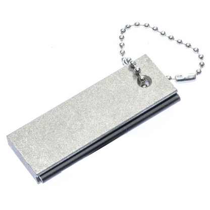 Full magnesium-body fire starter survival tool with a striker on a keychain.