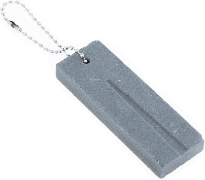 Aluminum oxide sharpening stone with an angled groove for fish hooks and blades.
