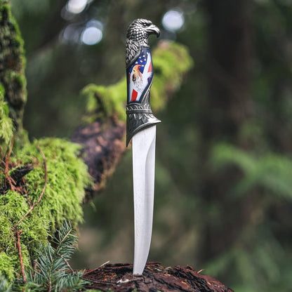 Wildlife collector hunting knife with a decorative scabbard, sleeve, and animal head handle (view 1).