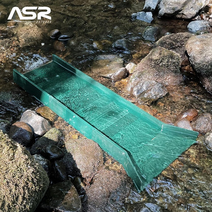 Green plastic multi-riffle sluice box for gold prospecting (view 2).