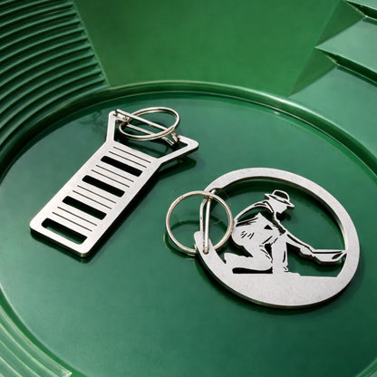 Stainless steel gold prospecting carabiner keychain with a split ring (view 9).