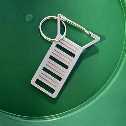 Stainless steel gold prospecting carabiner keychain with a split ring (view 8).