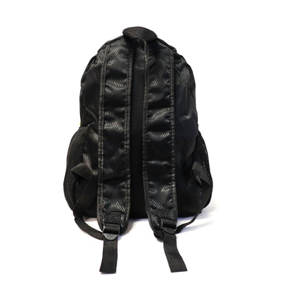 collapsible all black backpack transforms from as small as a pencil pouch to a medium sized backpack